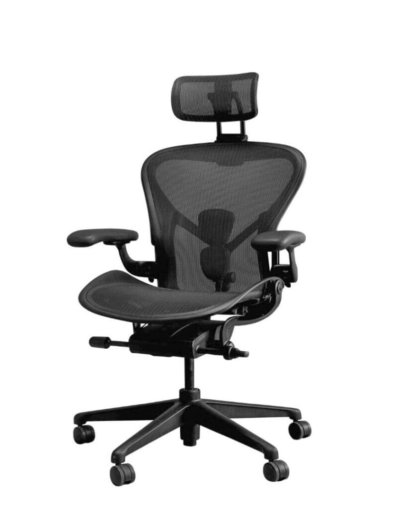 Ergonomic black office chair with mesh back, adjustable headrest, and armrests on rolling wheels. Ideal for home or workspace.